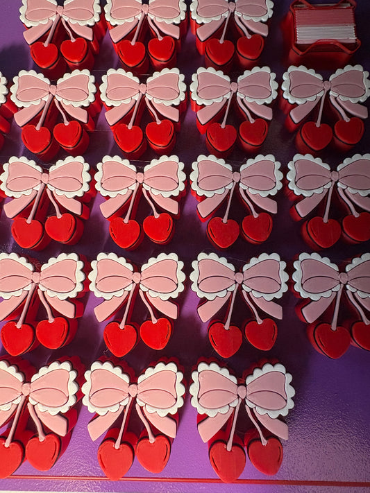 Cherry bow pearl strawtopper includes 15 units